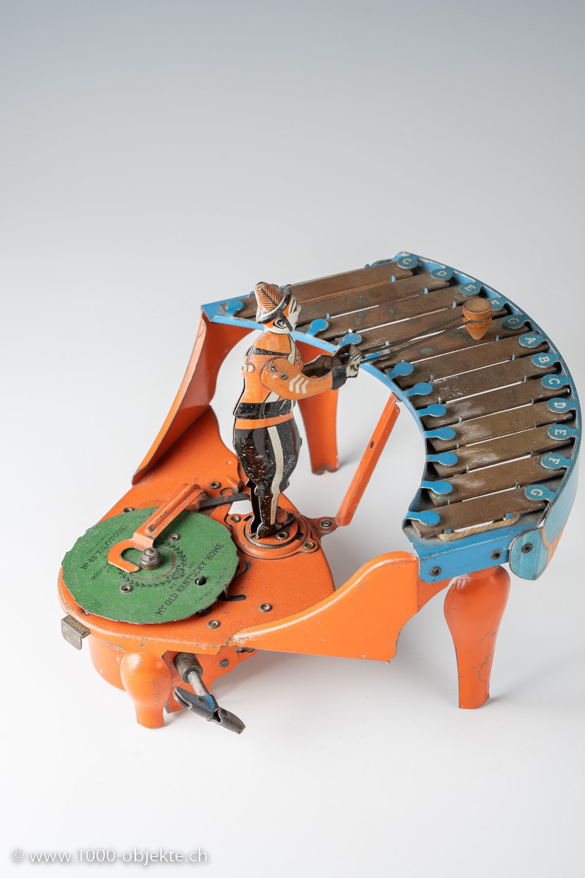 Wolverine Zilotone Musical Tin Litho Wind-Up Toythe Circa 1940S Wind-Up Clockwork Toy With Three Original Discs.